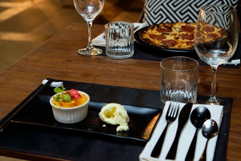 Caramelised custard dessert with a scoop of ice cream
