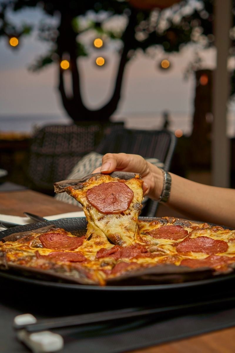 Pepperoni pizza with stretchy melted cheese